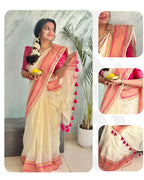 Off-White Mul Cotton Saree with medium sized pink and gold kanchi style border.