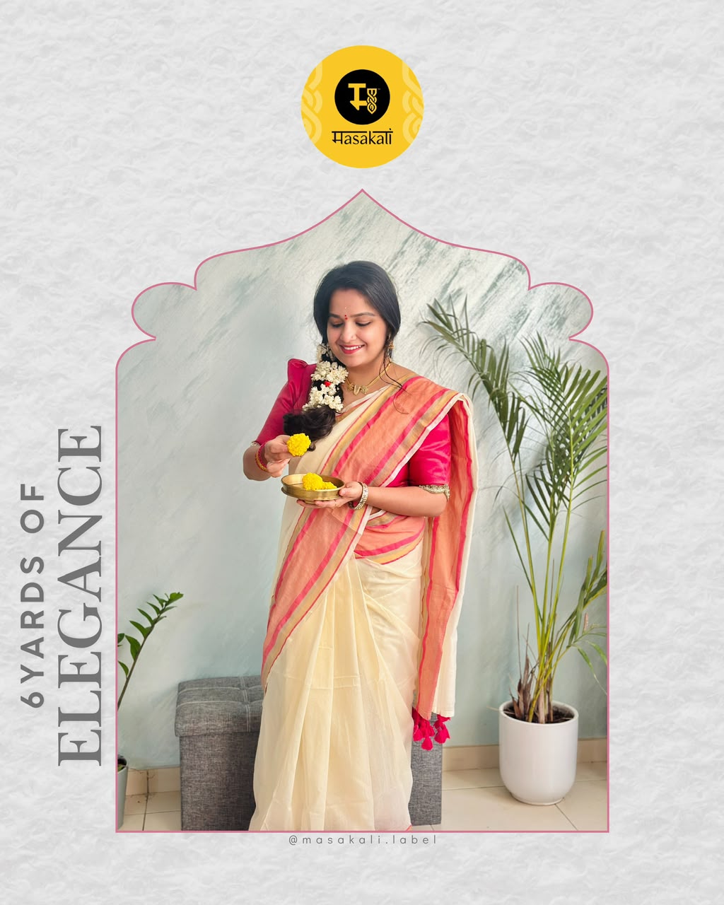 Off-White Mul Cotton Saree with medium sized pink and gold kanchi style border.